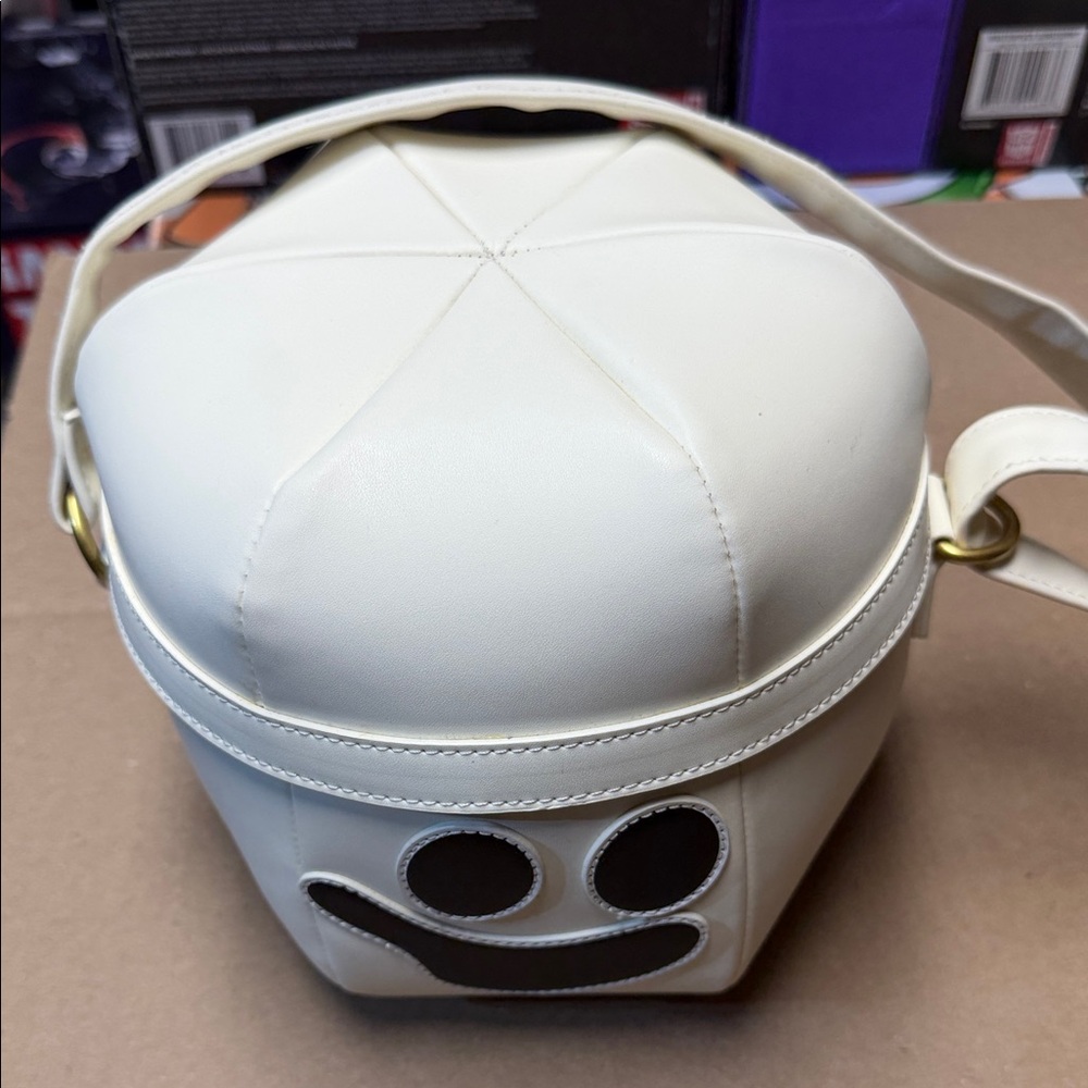 White glow in the dark Loungefly ghost Bag. Some indentations.